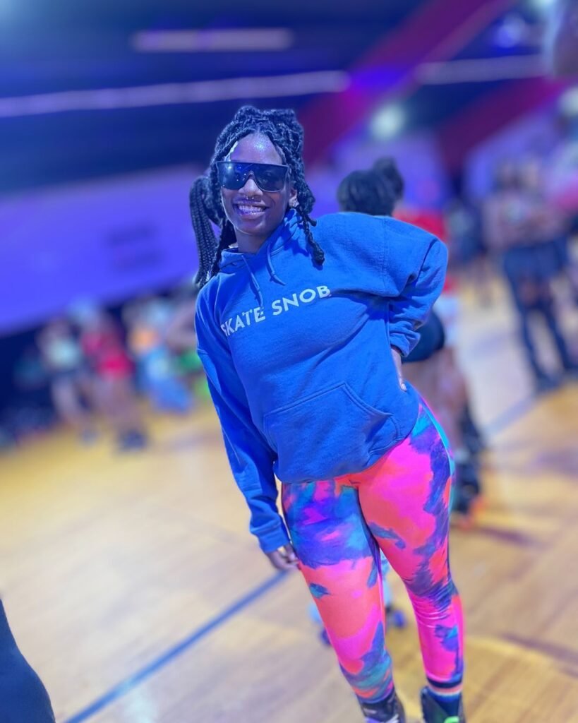 Woman wearing Skate Snob hoodie
