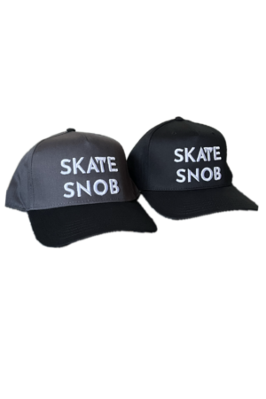 SKATE SNOB Branded Baseball Caps (Snapbacks) One is black with white raised embroidery. The other is grey/black bib with white raised embroidery.